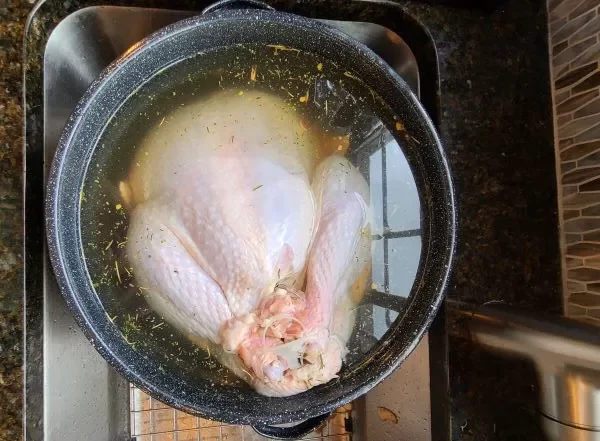 Brining-turkey-sitting-in-a-brining-pot